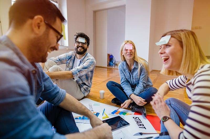 Colleagues enjoying a group activity during a work break